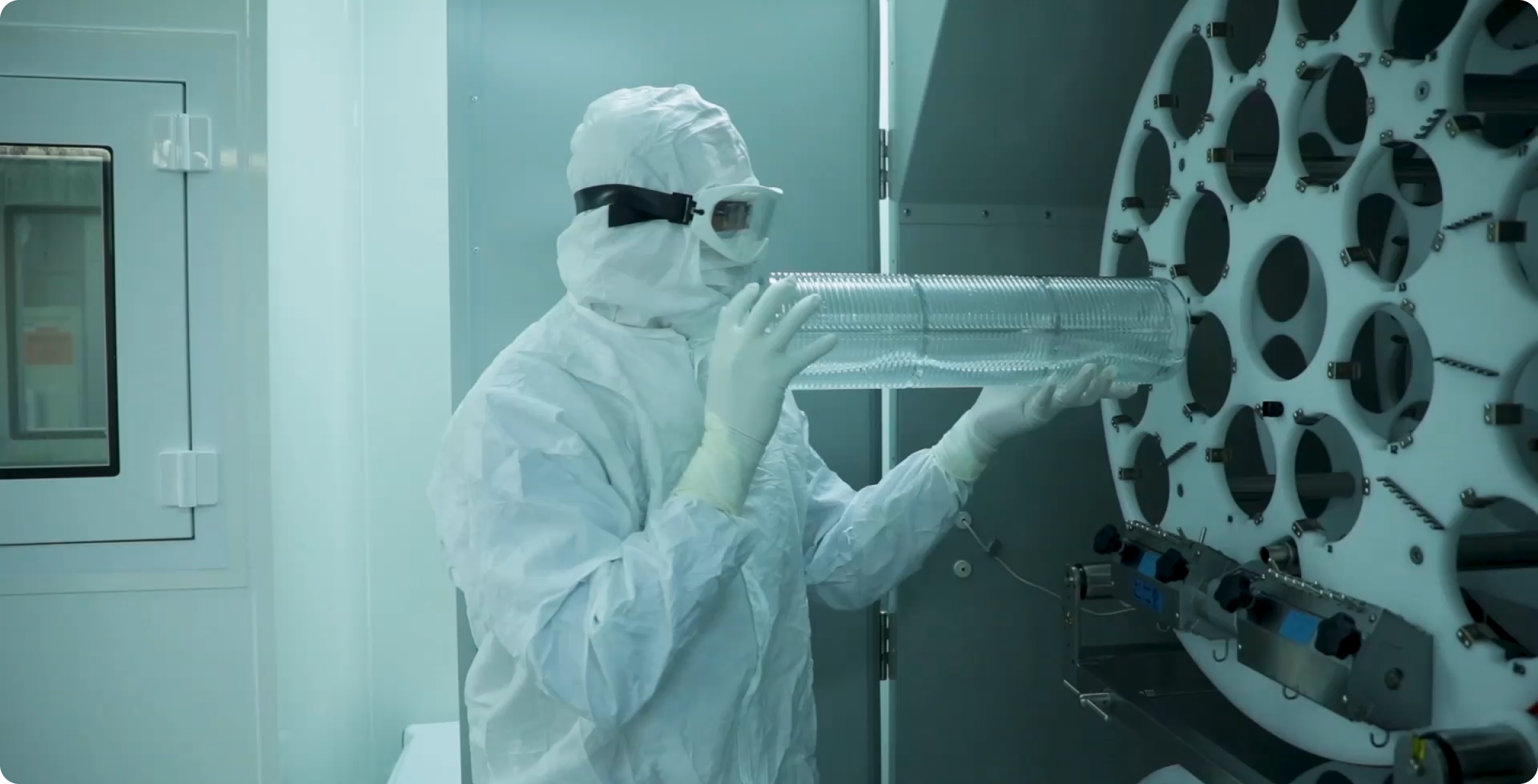 Technician working in a cleanroom at the Boreal Biomanufacturing facility